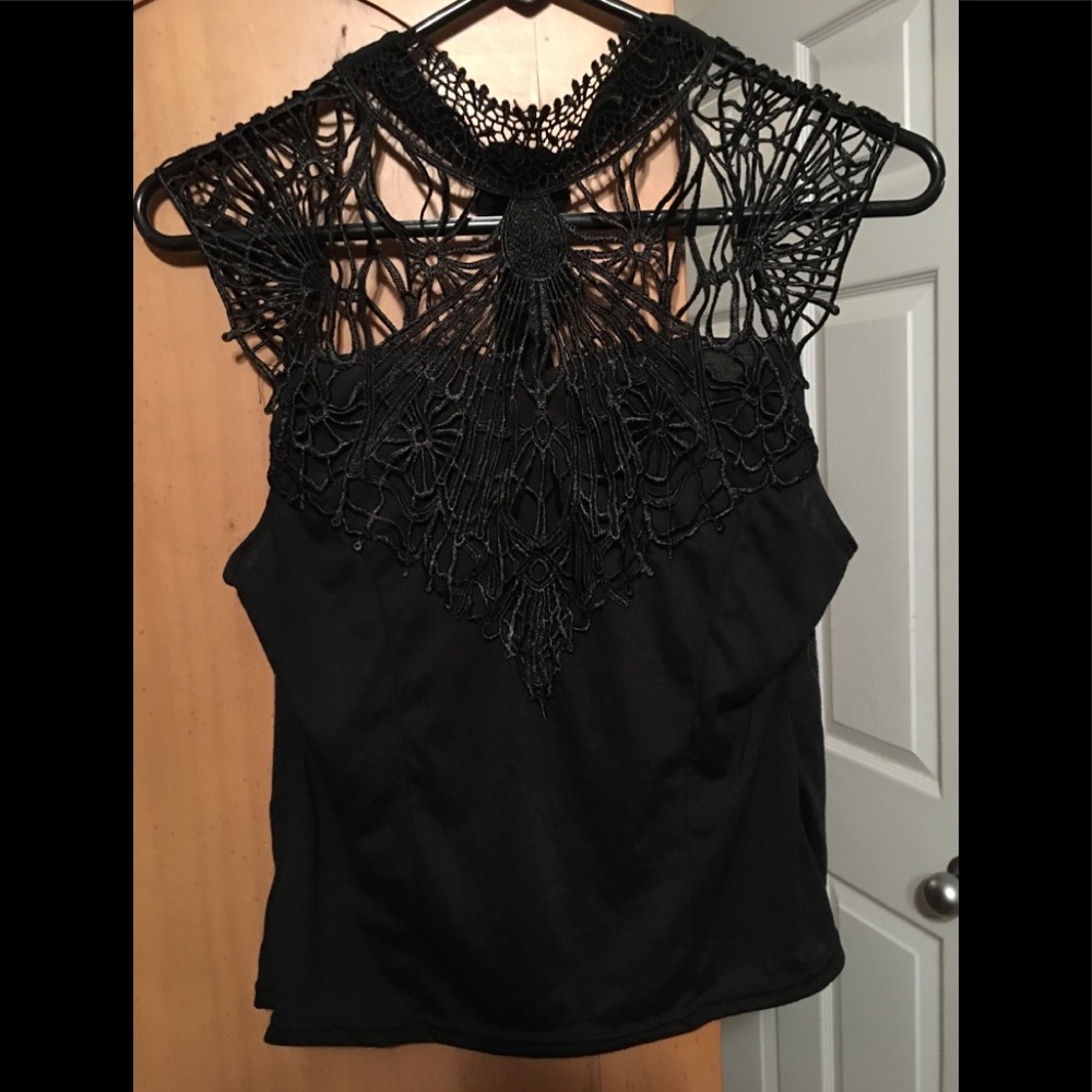 Black lace/web type top.